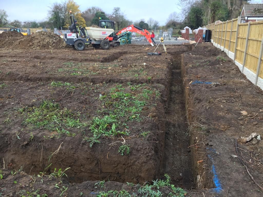 Foundation trenches dug and set out across the site